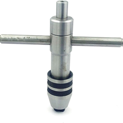 Precision Guiding Tap Wrenches with Freely Spinnable Cap -Design with Accurate Runout Control