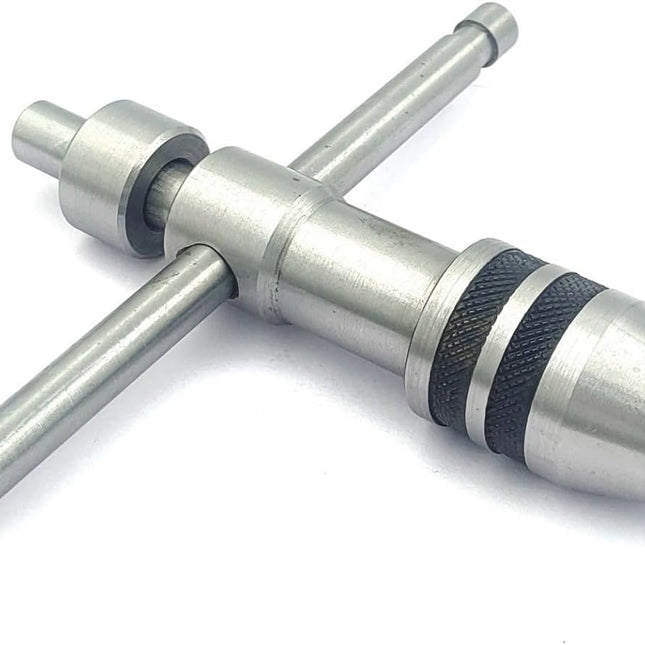 Precision Guiding Tap Wrenches with Freely Spinnable Cap -Design with Accurate Runout Control