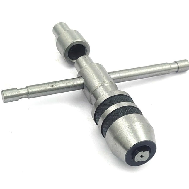Precision Guiding Tap Wrenches with Freely Spinnable Cap -Design with Accurate Runout Control