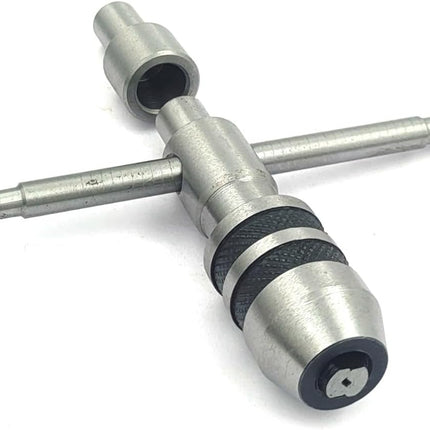 Precision Guiding Tap Wrenches with Freely Spinnable Cap -Design with Accurate Runout Control