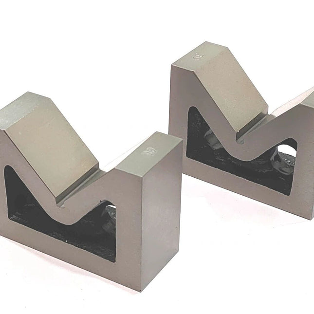 Seasoned caste iron v block pair